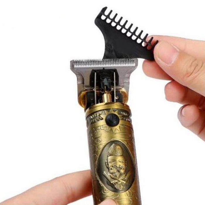 T-blade hair trimmer with guide comb
